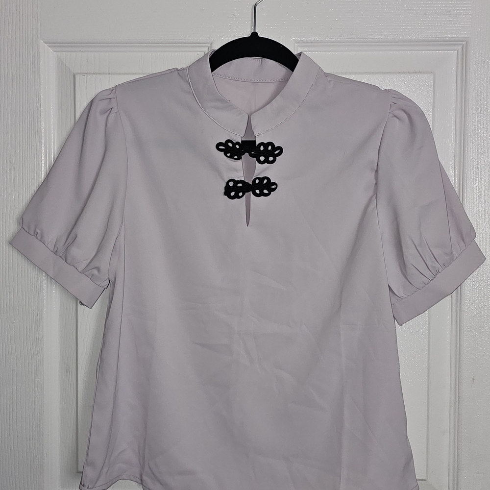 Elegant Women's Top with Black Accents